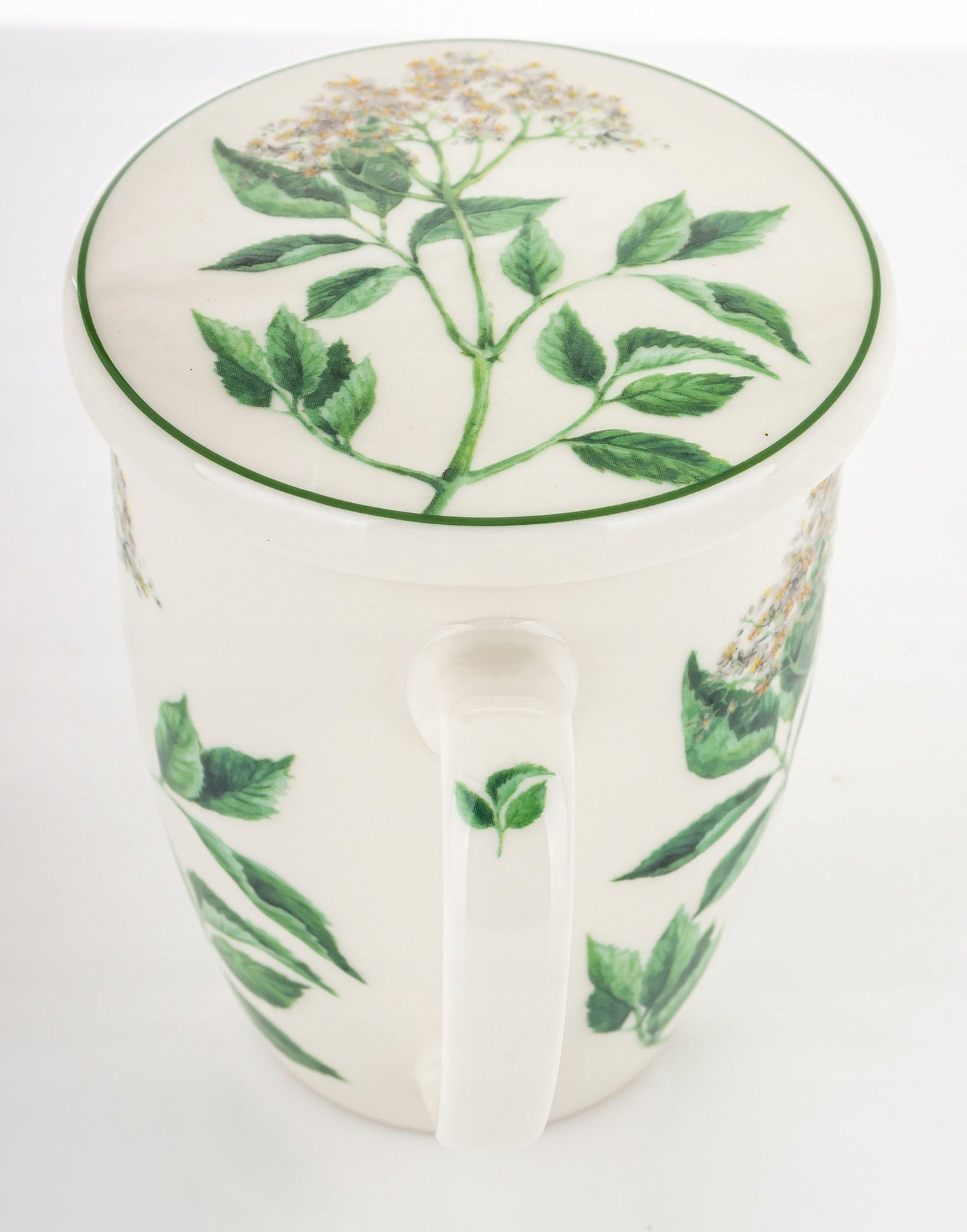 Elegancki kubek ceramiczny z zaparzaczem w pudełku prezentowym